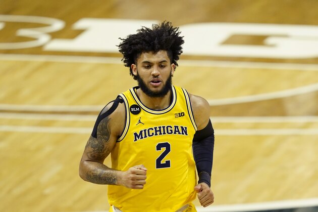 Michigan forward Isaiah Livers plays during the first half of an NCAA college basketball game, Sunday, March 7, 2021, in East Lansing, Mich. (AP Photo/Carlos Osorio)