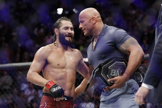 Jorge Masvidal, left, talks to Dwayne
