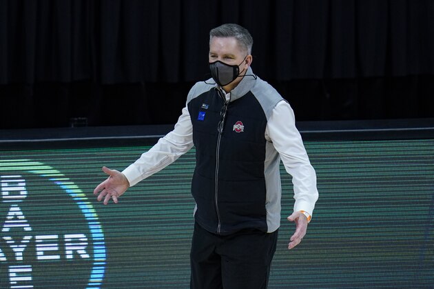 Ohio State head coach Chris Holtmann gestures in the first half of an NCAA college basketball game against Michigan at the Big Ten Conference tournament in Indianapolis, Saturday, March 13, 2021. (AP Photo/Michael Conroy)