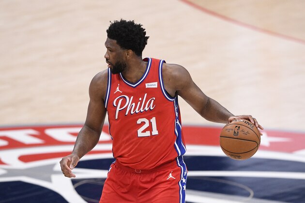 Philadelphia 76ers center Joel Embiid (21) in action during the second half of an NBA basketball game against the Washington Wizards, Friday, March 12, 2021, in Washington. (AP Photo/Nick Wass)