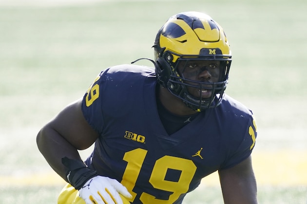 Michigan defensive lineman Kwity Paye (19) is seen during the first half of an NCAA college football game, Saturday, Oct. 31, 2020, in Ann Arbor, Mich. (AP Photo/Carlos Osorio)