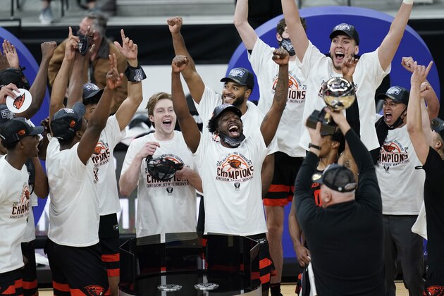 Oregon State players celebrate after defeating Colorado in an NCAA college basketball game in the championship of the Pac-12 men's tournament Saturday, March 13, 2021, in Las Vegas. (AP Photo/John Locher)