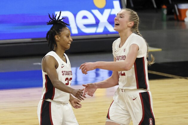 Stanford guard Kiana Williams (23) and Stanford forward Cameron Brink (22) react after scoring against Oregon State during the second half of an NCAA college basketball game in the semifinal round of the Pac-12 women's tournament Friday, March 5, 2021, in Las Vegas. (AP Photo/Isaac Brekken)