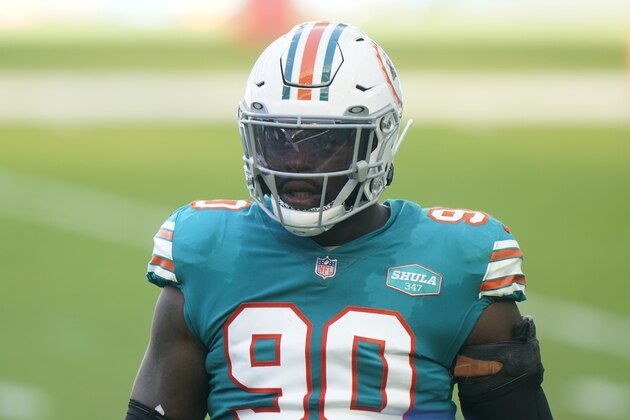 Miami Dolphins outside linebacker Shaq Lawson (90) waits for a play during the first half of an NFL football game against the Kansas City Chiefs, Sunday, Dec. 13, 2020, in Miami Gardens, Fla. (AP Photo/Wilfredo Lee)