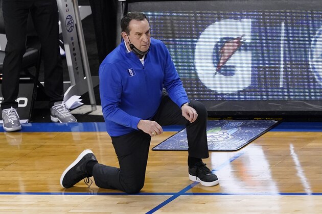 Duke head coach Mike Krzyzewski watches the action during the second half of an NCAA college basketball game against Louisville in the second round of the Atlantic Coast Conference tournament in Greensboro, N.C., Wednesday, March 10, 2021. (AP Photo/Gerry Broome)