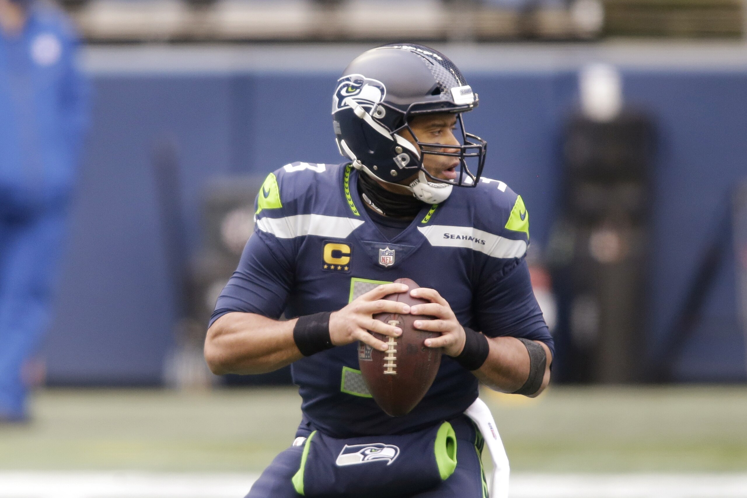 Seattle Seahawks quarterback Russell Wilson in action against the Los Angeles Rams in an NFL wild-card playoff football game, Saturday, Jan. 9, 2021, in Seattle. (AP Photo/Scott Eklund)