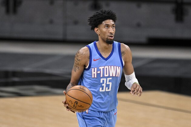 Houston Rockets' Christian Wood runs up the court during the second half of an NBA basketball game against the San Antonio Spurs, Saturday, Jan. 16, 2021, in San Antonio. San Antonio won 103-91. (AP Photo/Darren Abate)