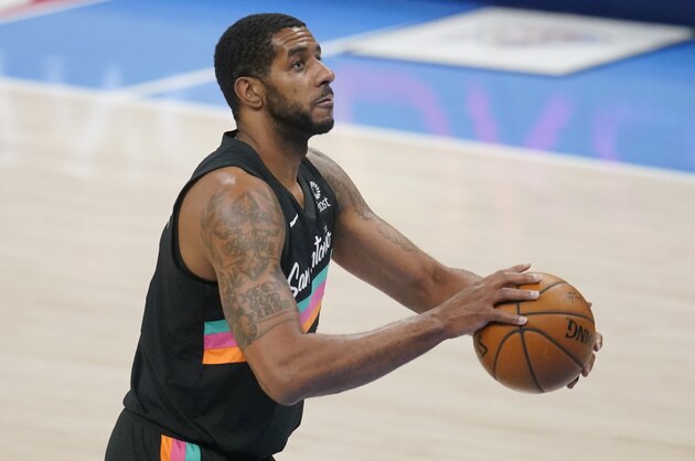 San Antonio Spurs center LaMarcus Aldridge (12) during an NBA basketball game against the Oklahoma City Thunder, Wednesday, Feb. 24, 2021, in Oklahoma City. (AP Photo/Sue Ogrocki)