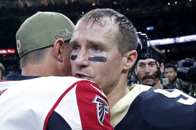 Atlanta Falcons quarterback Matt Ryan, left, greets New Orleans Saints quarterback Drew Brees after an NFL football game in New Orleans, Sunday, Nov. 10, 2019. The Falcons won 26-9. (AP Photo/Rusty Costanza)