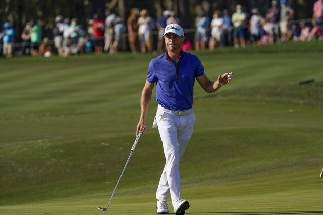 Justin Thomas celebrates after a birdie on the 16th hole during the final round of The Players Championship golf tournament Sunday, March 14, 2021, in Ponte Vedra Beach, Fla. (AP Photo/John Raoux)