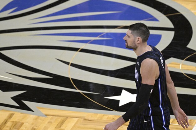 Orlando Magic center Nikola Vucevic walks back to the team's bench during a timeout in the second half of an NBA basketball game against the Atlanta Hawks, Wednesday, March 3, 2021, in Orlando, Fla. (AP Photo/Phelan M. Ebenhack)