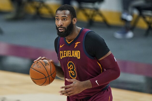 Cleveland Cavaliers' Andre Drummond drives the second half of an NBA basketball game against the Milwaukee Bucks, Friday, Feb. 5, 2021, in Cleveland. (AP Photo/Tony Dejak)