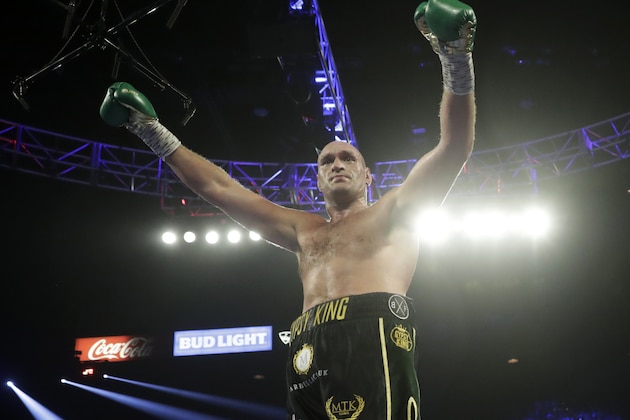 Tyson Fury, of England, celebrates during a WBC heavyweight championship boxing match against Deontay Wilder Saturday, Feb. 22, 2020, in Las Vegas. (AP Photo/Isaac Brekken)