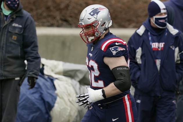 New England Patriots offensive lineman Joe Thuney walks to the field to warm up before an NFL football game against the New York Jets, Sunday, Jan. 3, 2021, in Foxborough, Mass. (AP Photo/Elise Amendola)