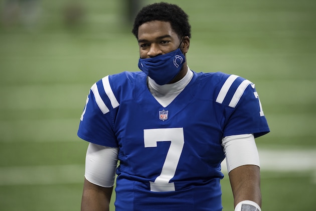 Indianapolis Colts quarterback Jacoby Brissett (7) walks down the sidelines during an NFL football game against the Jacksonville Jaguars on Sunday, Jan. 3, 2021, in Indianapolis. (AP Photo/Zach Bolinger)