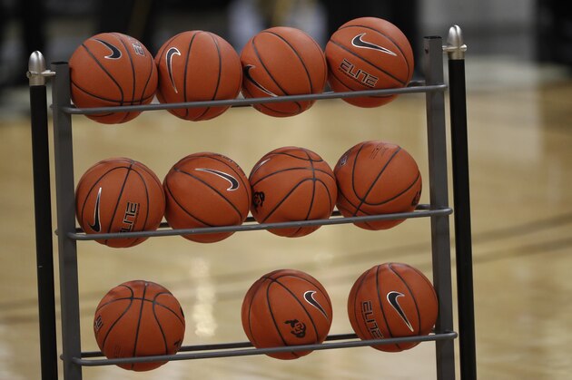 Basketballs sit in a rack in the first half of an NCAA college basketball game Thursday, Jan. 23, 2020, in Boulder, Colo. (AP Photo/David Zalubowski)