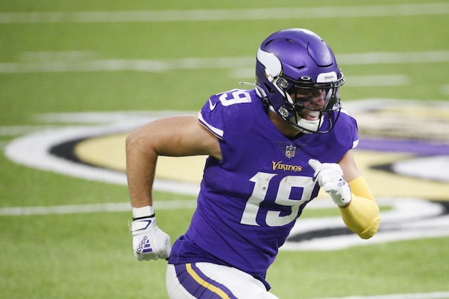 Minnesota Vikings wide receiver Adam Thielen runs up field during an NFL football game against the Chicago Bears, Sunday, Dec. 20, 2020, in Minneapolis. (AP Photo/Bruce Kluckhohn)