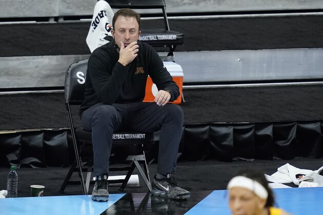 Minnesota head coach Richard Pitino watches during the first half of an NCAA college basketball game against Northwestern at the Big Ten Conference tournament, Wednesday, March 10, 2021, in Indianapolis. (AP Photo/Darron Cummings)