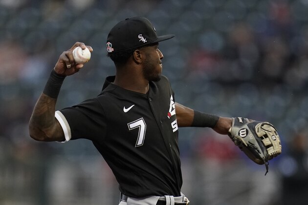 Chicago White Sox shortstop Tim Anderson throws to first base during the first inning of a spring training baseball game against the Cincinnati Reds Thursday, March 11, 2021, in Goodyear, Ariz. (AP Photo/Ross D. Franklin)