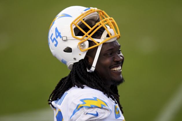 Los Angeles Chargers defensive end Melvin Ingram III (54) smiles on the sidelines against the Denver Broncos during the second half of an NFL football game, Sunday, Nov.. 1, 2020, in Denver. The Denver Broncos defeated the Los Angeles Chargers 31-30. (AP Photo/Justin Edmonds)
