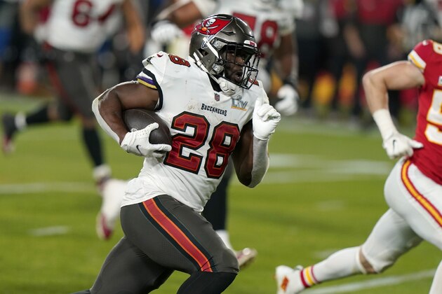 Tampa Bay Buccaneers running back Leonard Fournette sprints to the end zone to score on a 27-yard touchdown run during the second half of the NFL Super Bowl 55 football game against the Kansas City Chiefs, Sunday, Feb. 7, 2021, in Tampa, Fla. (AP Photo/Lynne Sladky)