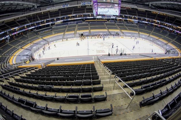 The Ice Crew clears the snow from the rink during a timeout during the second period of an NHL hockey game between the Pittsburgh Penguins and the Washington Capitals at PPG Paints Arena with no spectators in attendance, Sunday, Feb. 14, 2021, in Pittsburgh. (AP Photo/Keith Srakocic) The Ice Crew clears the snow from the rink during a timeout during the second period of an NHL hockey game between the Pittsburgh Penguins and the Washington Capitals at PPG Paints Arena with no spectators in attendance, Sunday, Feb. 14, 2021, in Pittsburgh. (AP Photo/Keith Srakocic)