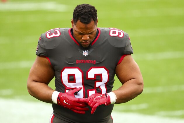Tampa Bay Buccaneers defensive end Ndamukong Suh (93) walks to the locker room prior to an NFL football game against the Atlanta Falcons, Sunday, Jan. 3, 2021, in Tampa, Fla. (AP Photo/Kevin Sabitus)