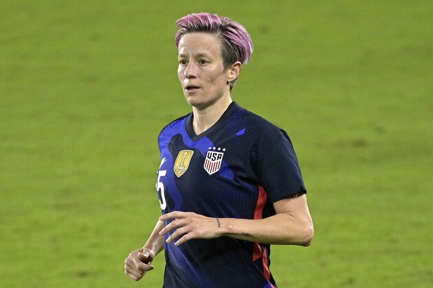 United States forward Megan Rapinoe (15) follows a play during the second half of a SheBelieves Cup women's soccer match against Argentina, Wednesday, Feb. 24, 2021, in Orlando, Fla. (AP Photo/Phelan M. Ebenhack)