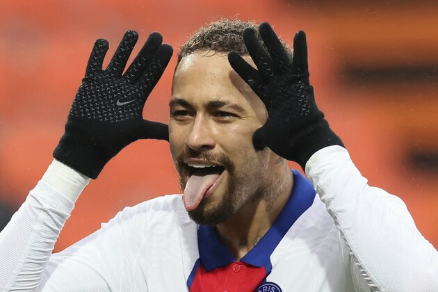 PSG's Neymar celebrates after scoring his side's second goal during the French League One soccer match between FC Lorient and Paris Saint-Germain at the Moustoir stadium in Lorient, western France, Sunday, Jan. 31, 2021. (AP Photo/David Vincent)