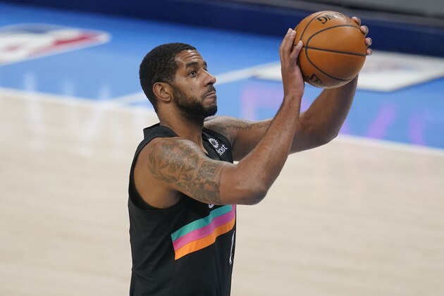 San Antonio Spurs center LaMarcus Aldridge (12) during an NBA basketball game against the Oklahoma City Thunder, Wednesday, Feb. 24, 2021, in Oklahoma City. (AP Photo/Sue Ogrocki)