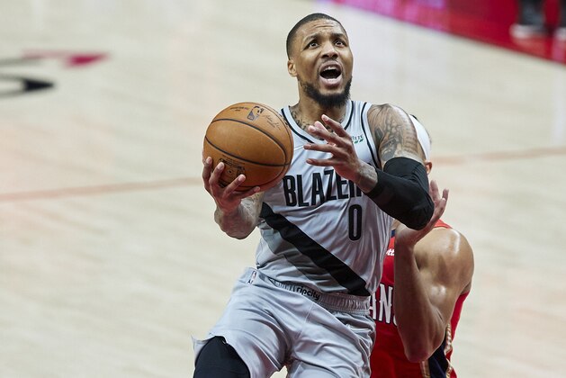 Portland Trail Blazers guard Damian Lillard shoots against the New Orleans Pelicans during the second half of an NBA basketball game in Portland, Ore., Tuesday, March 16, 2021. (AP Photo/Craig Mitchelldyer)