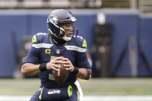 Seattle Seahawks quarterback Russell Wilson in action against the Los Angeles Rams in an NFL wild-card playoff football game, Saturday, Jan. 9, 2021, in Seattle. (AP Photo/Scott Eklund)