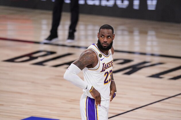 Los Angeles Lakers' LeBron James (23) looks on after scoring and being fouled during the first half in Game 3 of basketball's NBA Finals against Miami Heat, Sunday, Oct. 4, 2020, in Lake Buena Vista, Fla. (AP Photo/Mark J. Terrill) Los Angeles Lakers' LeBron James (23) looks on after scoring and being fouled during the first half in Game 3 of basketball's NBA Finals against Miami Heat, Sunday, Oct. 4, 2020, in Lake Buena Vista, Fla. (AP Photo/Mark J. Terrill)