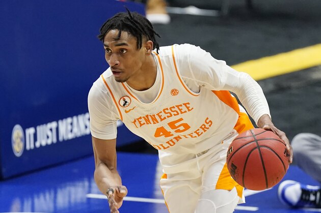 Tennessee's Keon Johnson plays against Florida during the NCAA college basketball Southeastern Conference Tournament Friday, March 12, 2021, in Nashville, Tenn. (AP Photo/Mark Humphrey)
