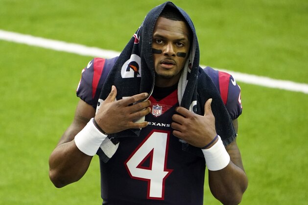 FILE - In this Jan. 3, 2021, file photo, Houston Texans quarterback Deshaun Watson walks off the field before an NFL football game against the Tennessee Titans in Houston. J.J. Watt is gone from the Texans and Watson wants out, too. The Texans have been making plenty of headlines this offseason. Not one has been good. (AP Photo/Eric Christian Smith, File)