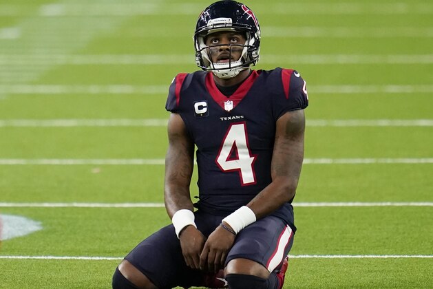 Houston Texans quarterback Deshaun Watson (4) kneels / sits on the field in frustration during an NFL football game against the Tennessee Titans, Sunday, Jan. 3, 2021, in Houston. (AP Photo/Matt Patterson)