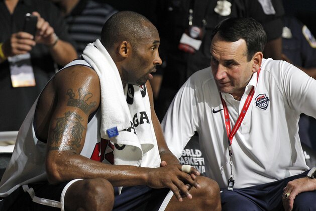 USA Basketball Men's National Team guard Kobe Bryant, left, talks with head coach Mike Krzyzewski during a practice Saturday, July 14, 2012 in Washington. (AP Photo/Alex Brandon)