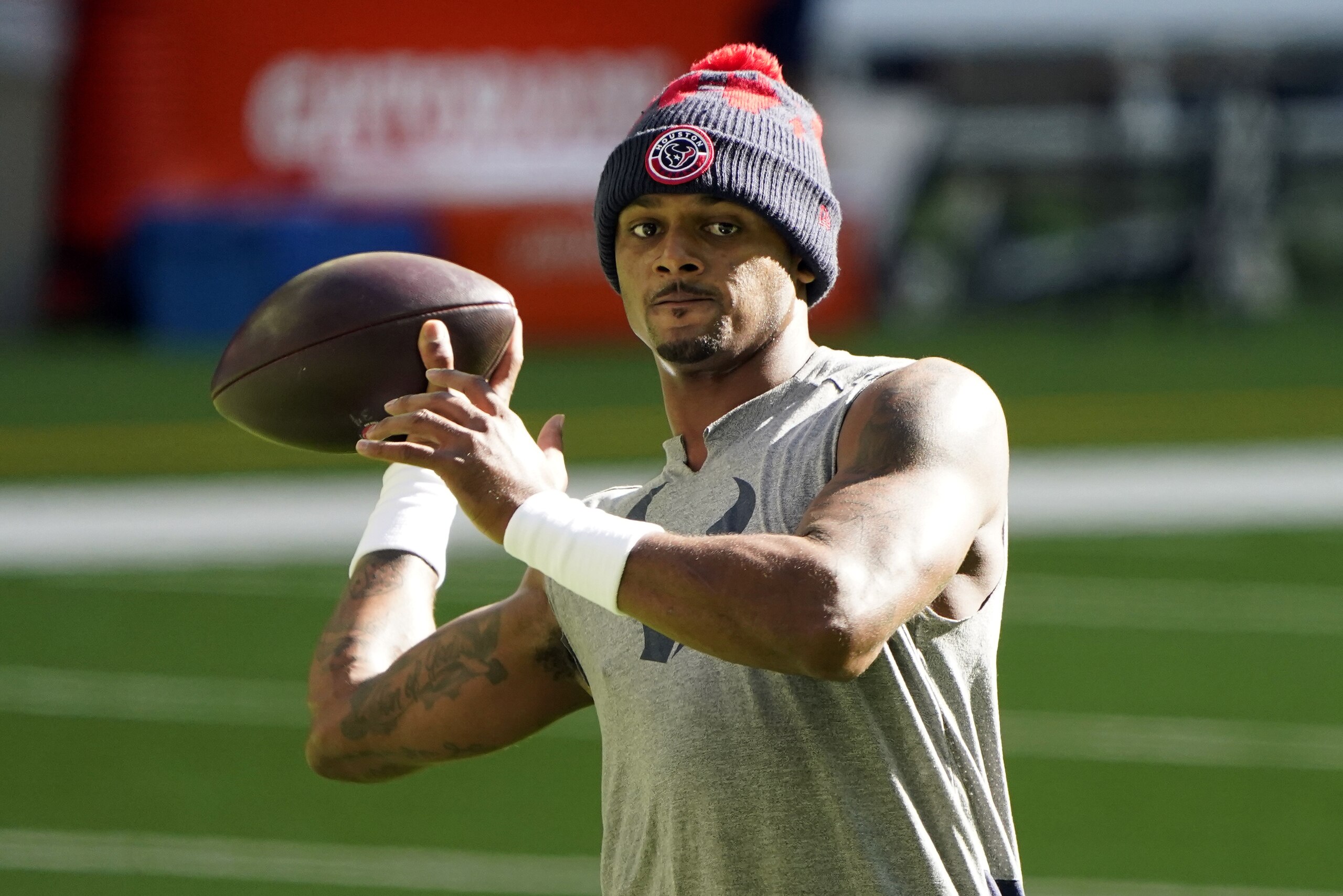 Houston Texans quarterback Deshaun Watson warms up beforean NFL football game against the Tennessee Titans Sunday, Jan. 3, 2021, in Houston. (AP Photo/Eric Christian Smith)