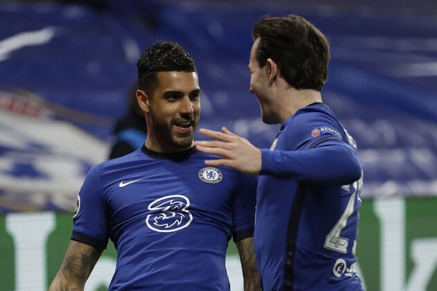 Chelsea's Emerson Palmieri, left, celebrates after scoring his side's second goal during the Champions League, round of 16, second leg soccer match between Chelsea and Atletico Madrid at the Stamford Bridge stadium, London, Wednesday, March 17, 2021. (AP Photo/Matt Dunham)