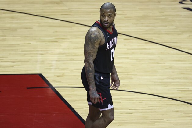 Houston Rockets forward P.J. Tucker (17) reacts after a play during the second quarter of an NBA basketball game against the Memphis Grizzlies, Sunday, Feb. 28, 2021, in Houston. (Troy Taormina/Pool Photo via AP)
