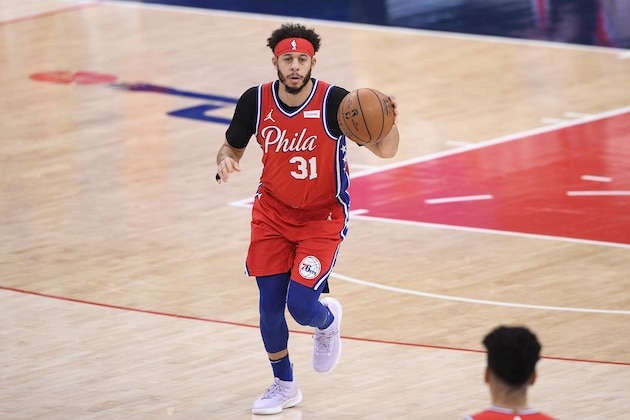 Philadelphia 76ers guard Seth Curry (31) dribbles the ball during the second half of an NBA basketball game against the Washington Wizards, Friday, March 12, 2021, in Washington. (AP Photo/Nick Wass)
