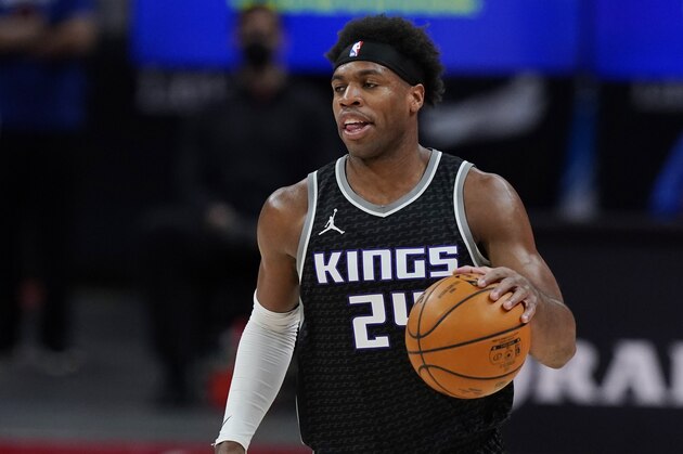 Sacramento Kings guard Buddy Hield plays during the first half of an NBA basketball game, Friday, Feb. 26, 2021, in Detroit. (AP Photo/Carlos Osorio)