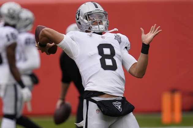 Las Vegas Raiders quarterback Marcus Mariota (8) in the first half of an NFL football game Sunday, Jan. 3, 2021, in Denver. (AP Photo/David Zalubowski)