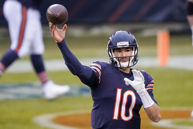 Chicago Bears' Mitchell Trubisky warms up before an NFL football game against the Green Bay Packers Sunday, Jan. 3, 2021, in Chicago. (AP Photo/Nam Y. Huh)