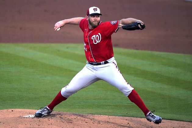 Washington Nationals starting pitcher Stephen Strasburg throws during the first inning of the team's spring training baseball game against the Houston Astros, Tuesday, March 9, 2021, in West Palm Beach, Fla. (AP Photo/Lynne Sladky)