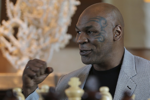 Mike Tyson makes a fist during an interview with The Associated Press, in Dubai, United Arab Emirates, Thursday, May 4, 2017. Tyson is in Dubai to announce the start of his worldwide boxing gym franchise. Tyson said Thursday that a city like Dubai can show people the best of the Middle East, its people and Islam. Tyson praised the sheikhdom as