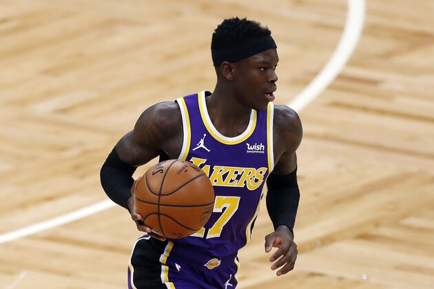 Los Angeles Lakers' Dennis Schroder plays against the Boston Celtics during the first half of an NBA basketball game, Saturday, Jan. 30, 2021, in Boston. (AP Photo/Michael Dwyer)