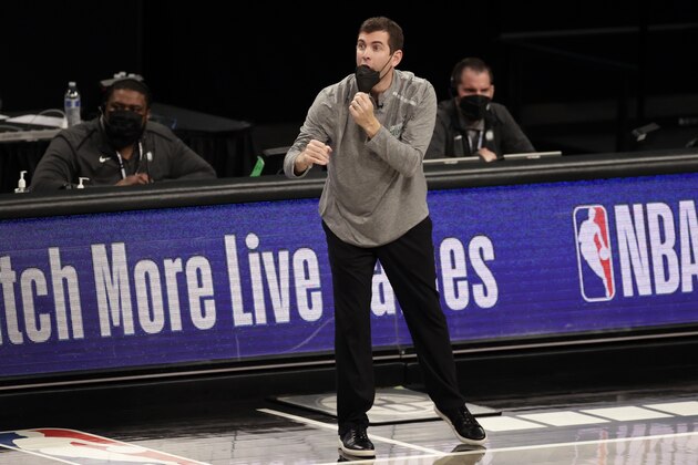 Boston Celtics head coach Brad Stevens direct his team against the Brooklyn Nets during the second half of an NBA basketball game, Thursday, March 11, 2021, in New York. The Nets won 120-109. (AP Photo/Adam Hunger)