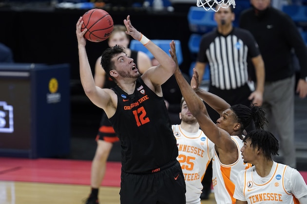 Oregon State center Roman Silva (12) shoots against Tennessee during the second half of a men's college basketball game in the first round of the NCAA tournament at Bankers Life Fieldhouse in Indianapolis, Friday, March 19, 2021. (AP Photo/Paul Sancya)