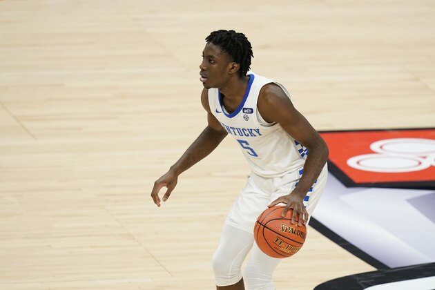 Kentucky's Terrence Clarke (5) dribbles during the second half of an NCAA college basketball game against Kansas, Tuesday, Dec. 1, 2020, in Indianapolis. (AP Photo/Darron Cummings)